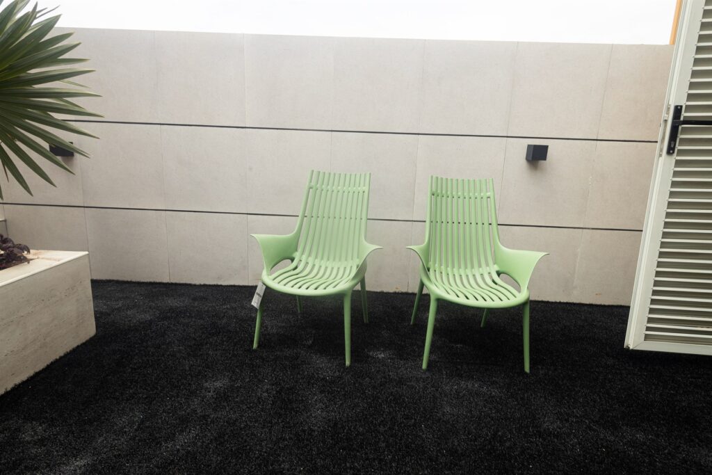 Brum Height 6: Outdoor rooftop seating nook with two chairs